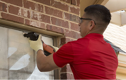 Insulated Glass Units - Double Pane Windows Glass Doctor specialist repairing an insulated glass unit (IGU)